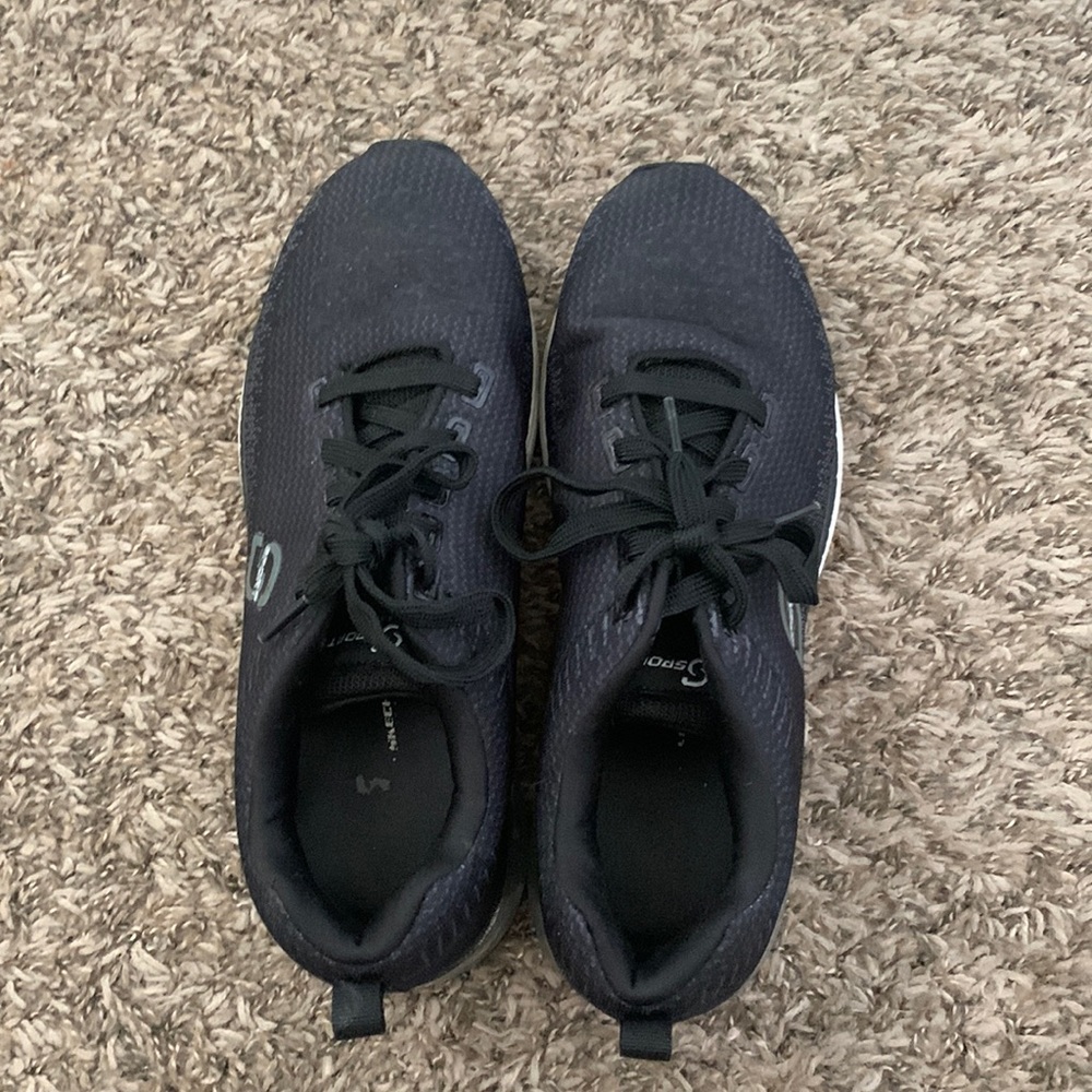 Women black sketcher work shoes
